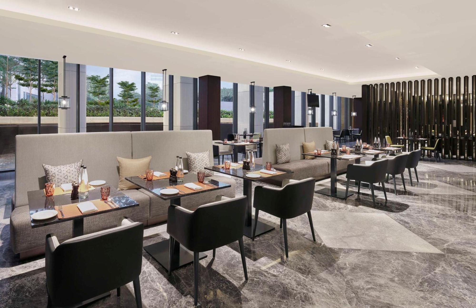 Hotel Hilton Bengaluru Embassy Manyata Business Park Esterno foto