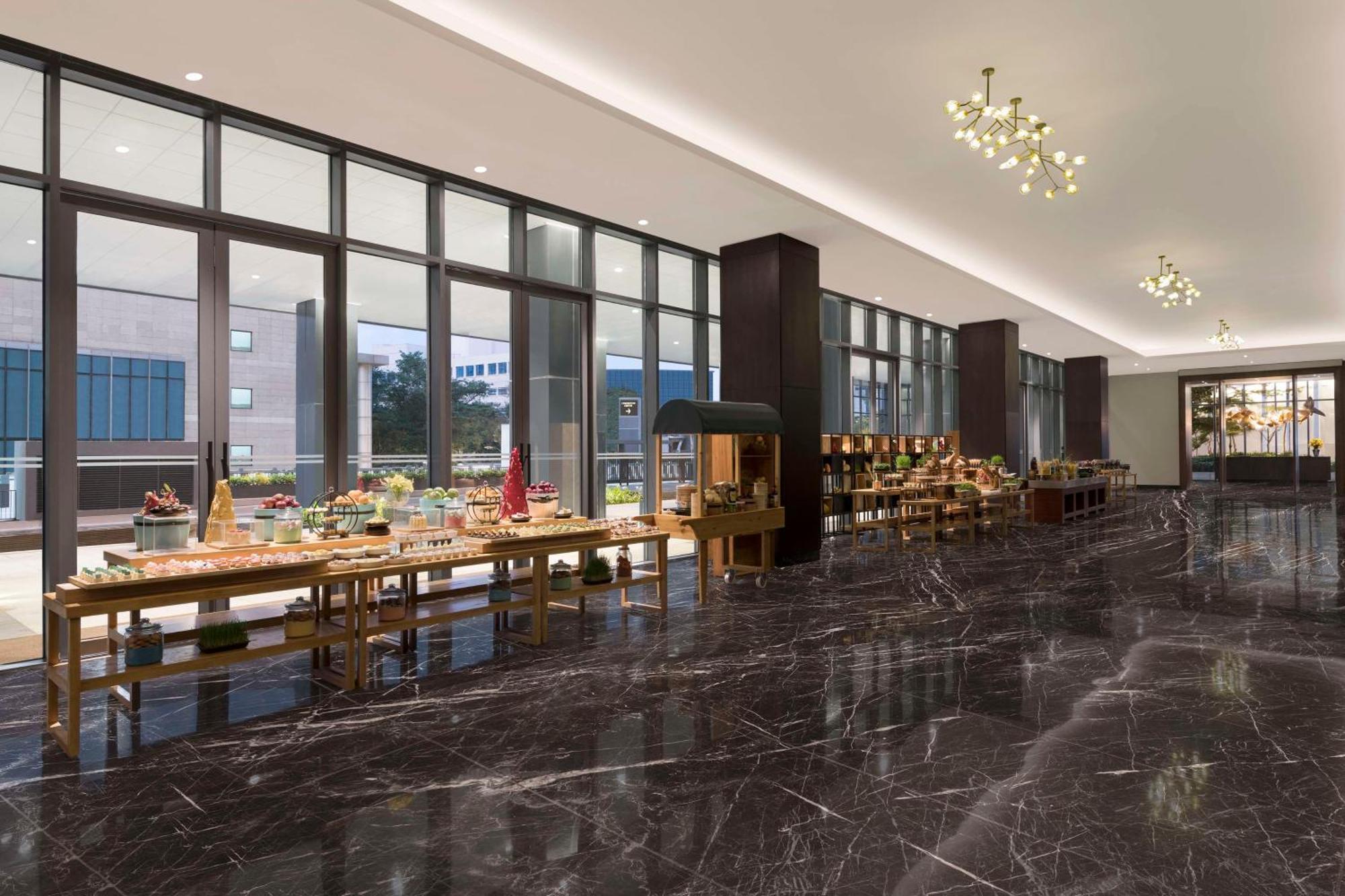 Hotel Hilton Bengaluru Embassy Manyata Business Park Esterno foto
